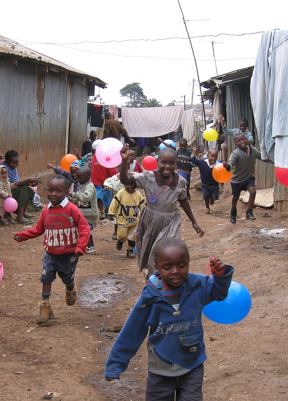 Children running in street