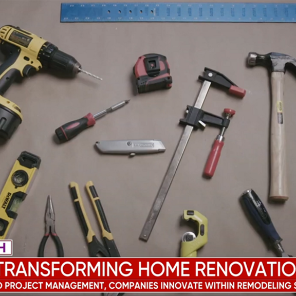 Screenshot of TV broadcast showing home remodeling tools.
