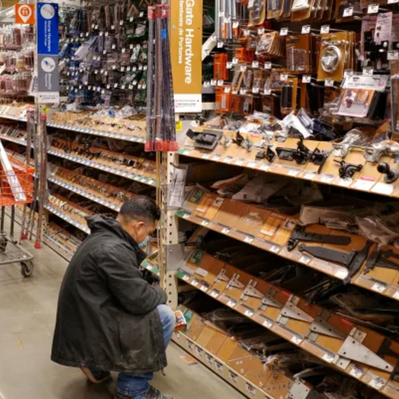 People shopping in a home improvement retailer.
