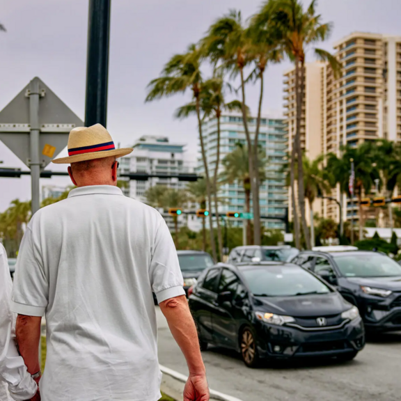 Elderly couple walking on the sidewalks in Miami