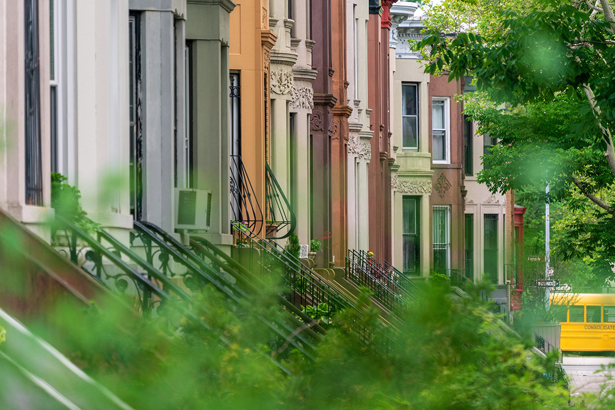 Block of townhouses with staircases.