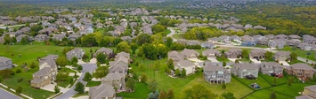 Aerial view of large suburban homes